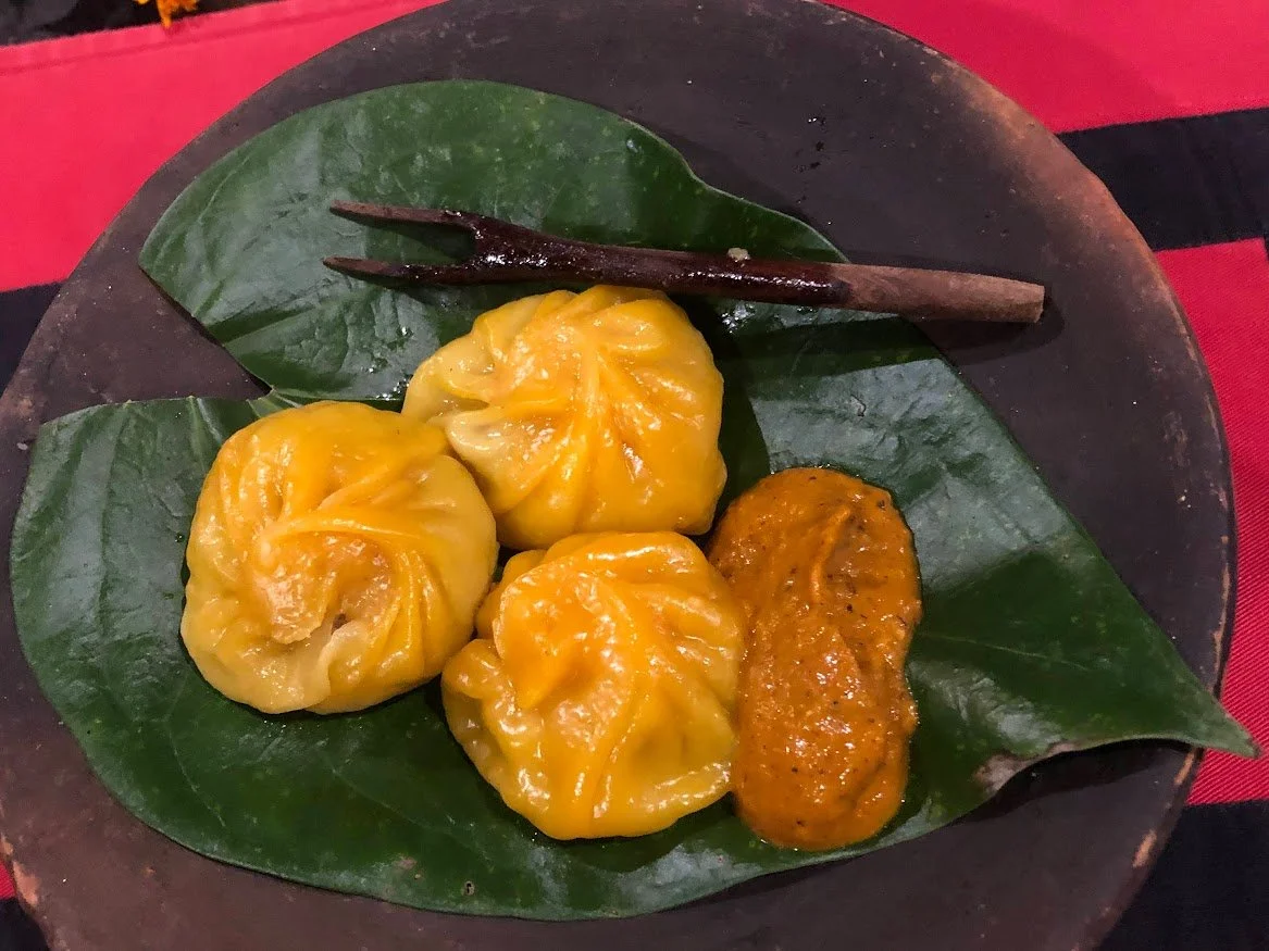 food veggie momos on leaf on plate nepal