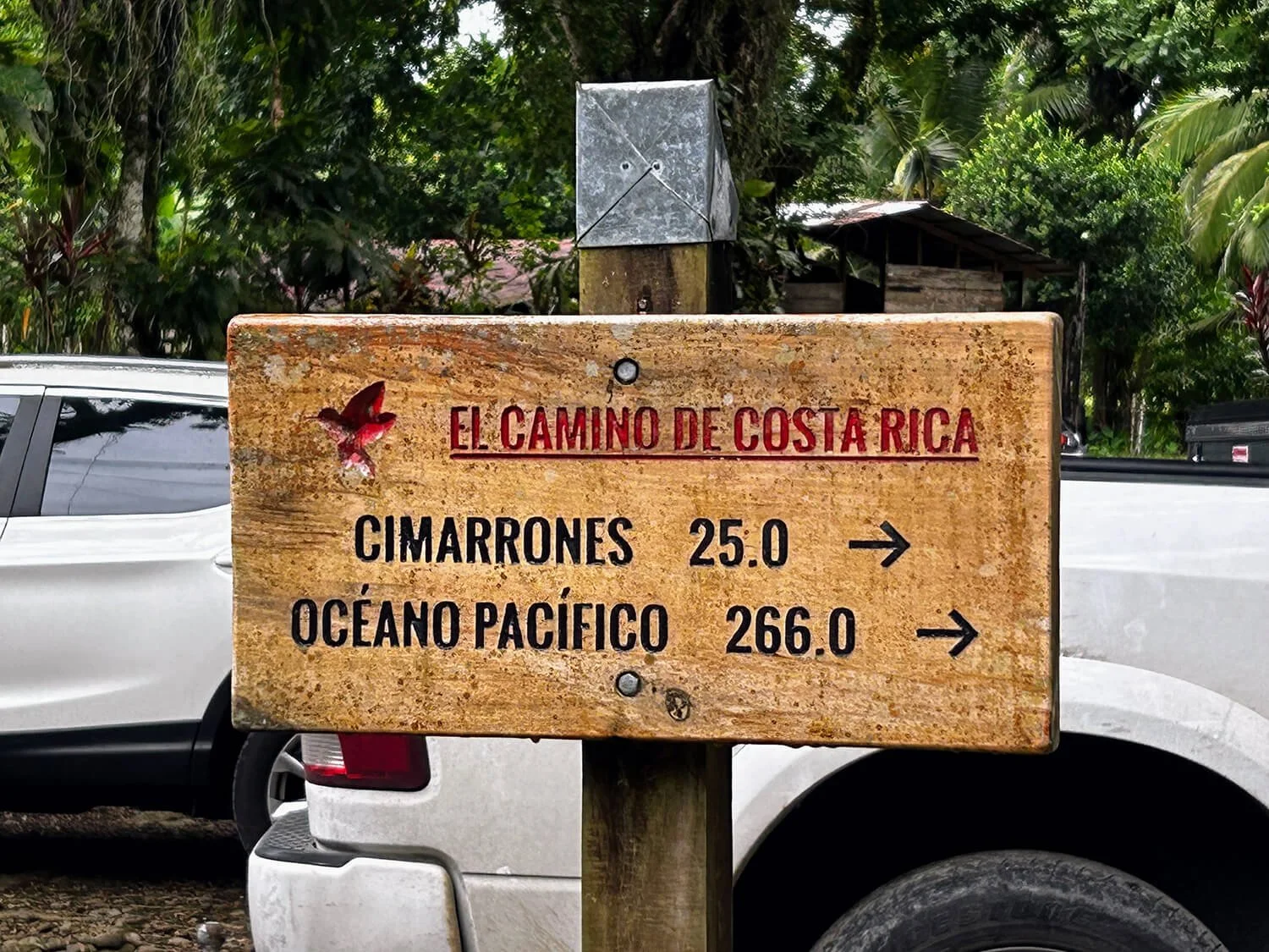 camino de costa rica sign post cimarrones pacific ocean hummingbird