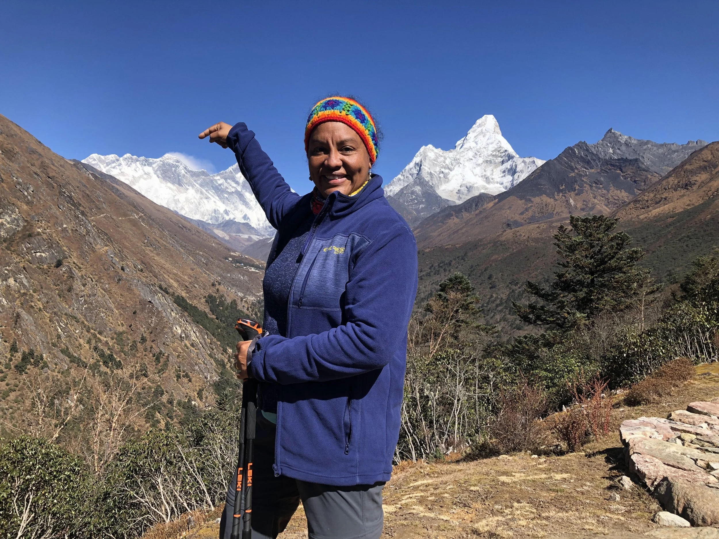 woman hiker mounting to mount everest