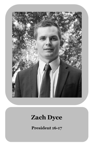 A black and white graduation portrait of Zach Dyce, President 2016-2017, wearing a suit and tie outdoors.