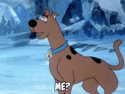 a gif of a surprised Scooby-Doo pointing to himself with text saying "me?"