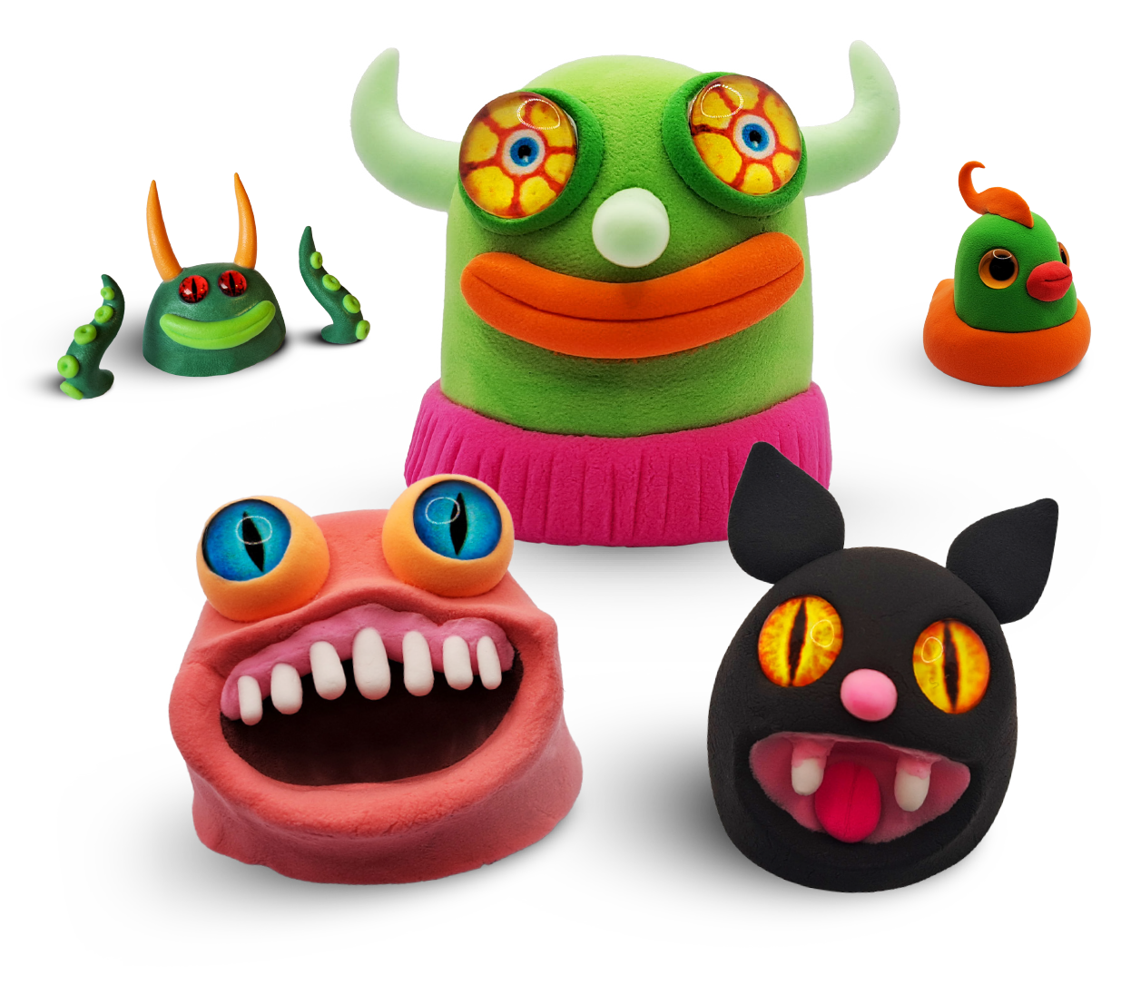 Colorful clay characters resembling monsters and creatures with exaggerated features, large eyes, and vibrant colors, arranged on a white surface.