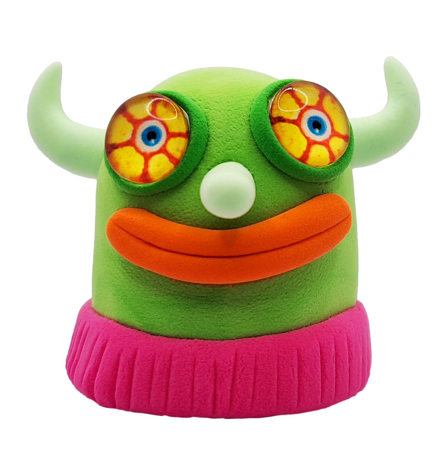 Colorful imaginary whimsical creature with green body, light green horns, large eyes with fiery yellow and red patterns, orange lips, light green nose, and pink turtle neck jumper.