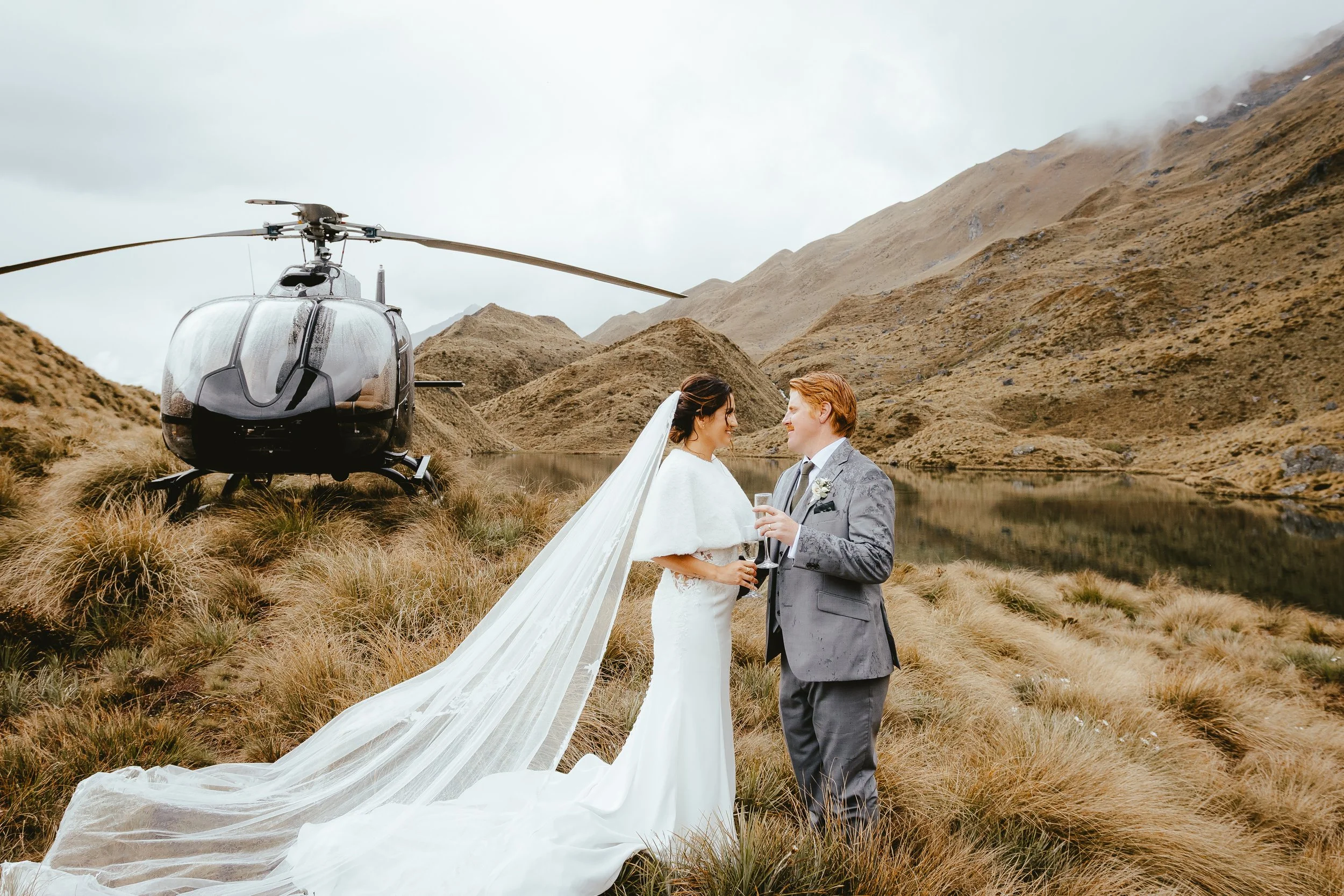 Couple celebrating their heli elopement