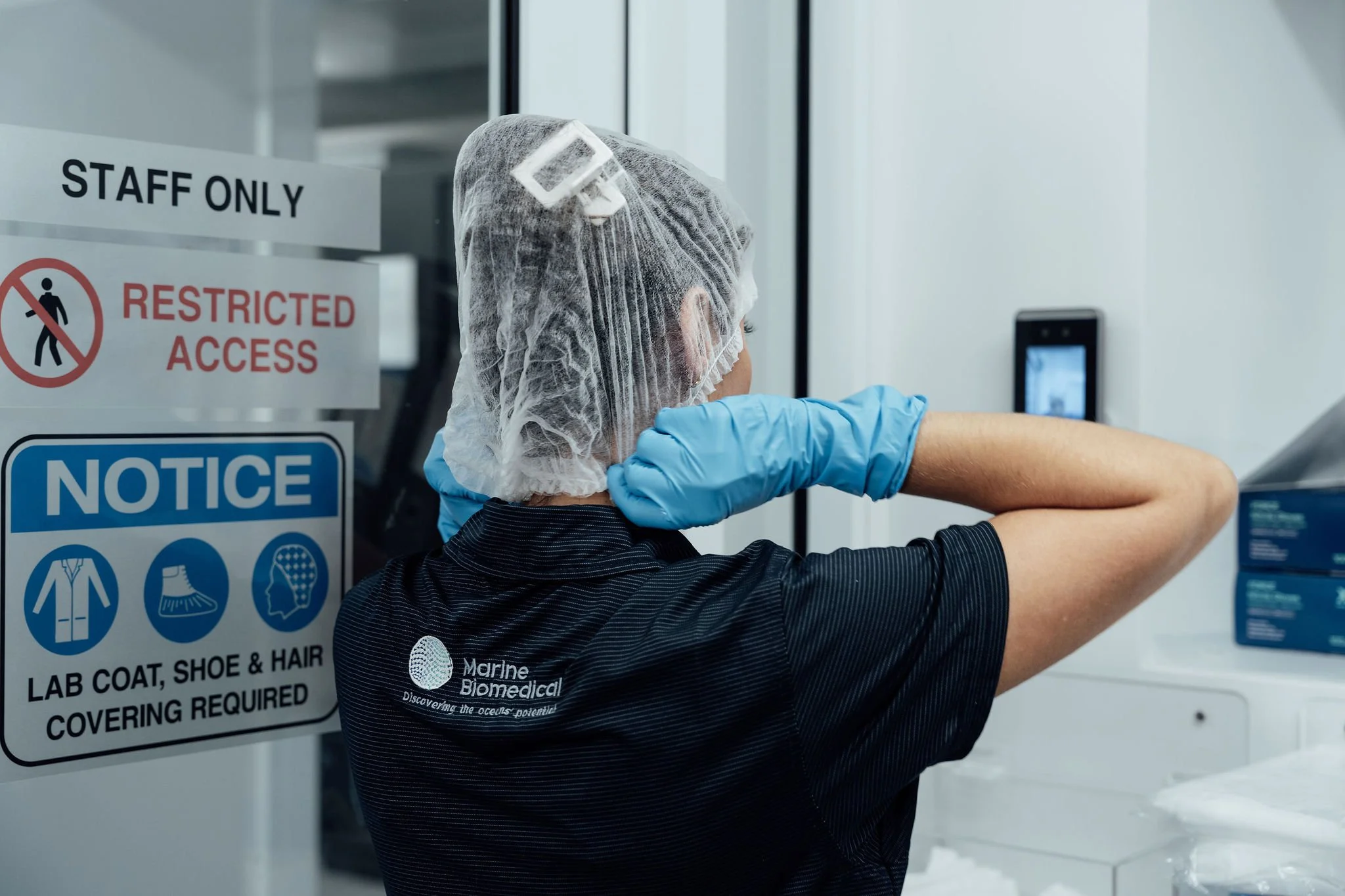 Controlled cleanroom environment with staff-only access for biomaterial handling and processing