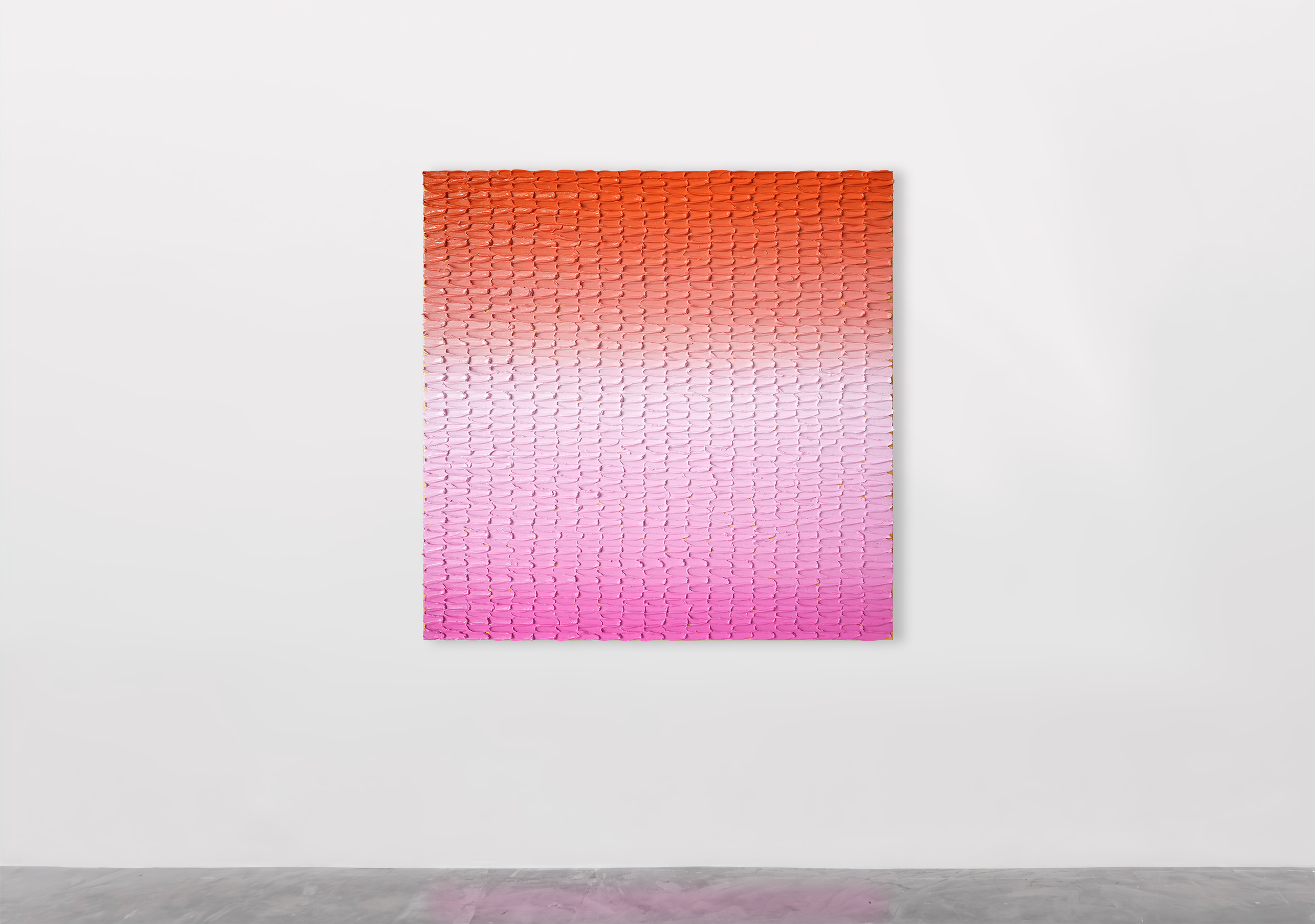 A square acrylic painting with a horizontal ombre color gradient from orange at the top to pink at the bottom on a light gray gallery wall.