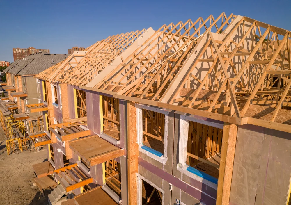 Wood framing of new townhomes under construction