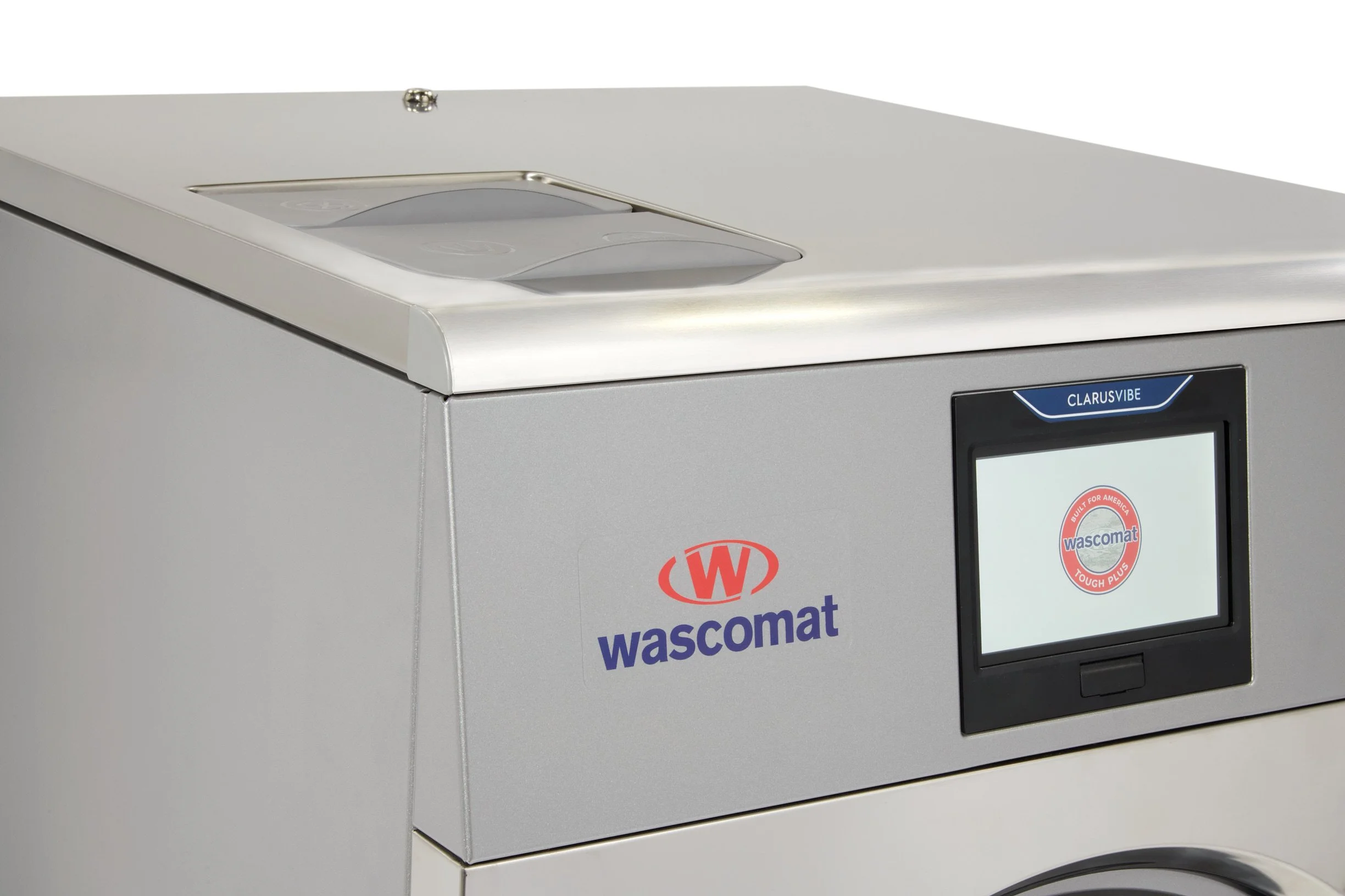 Close-up of a Wascomat commercial washing machine with a digital display screen.