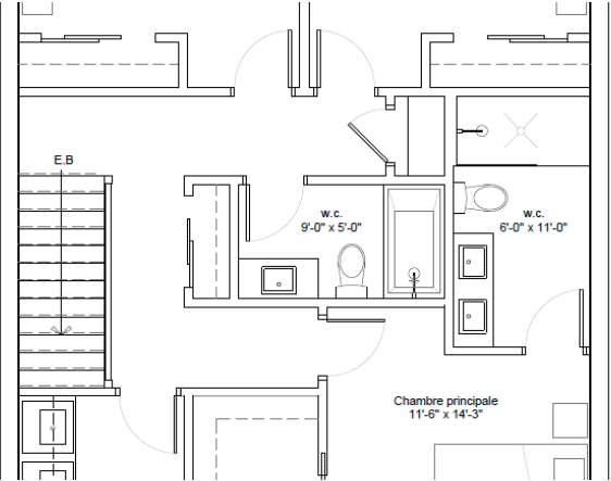 Floor plan of a house showing bedrooms, bathrooms, and hallways with room dimensions labeled.