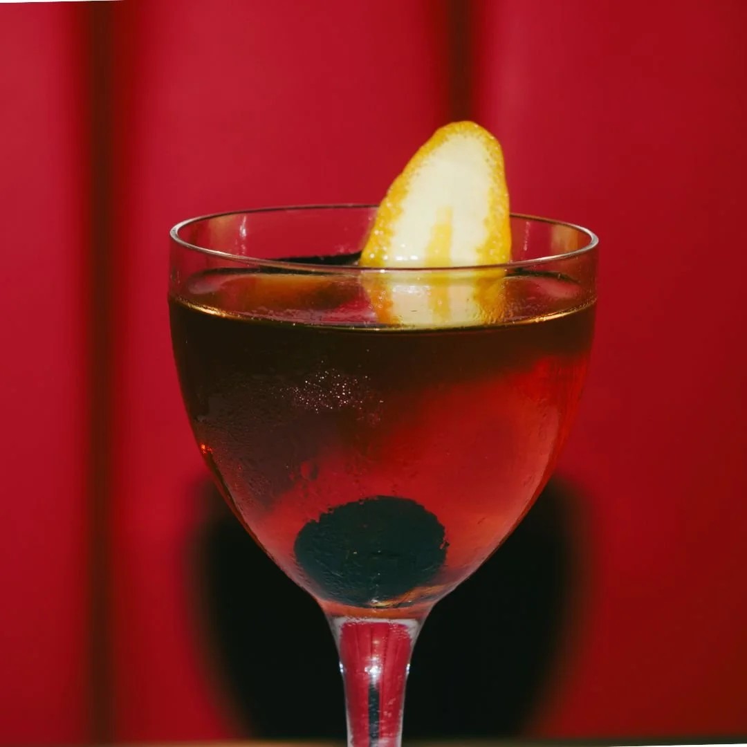 A glass of our house cocktail, Italian American.