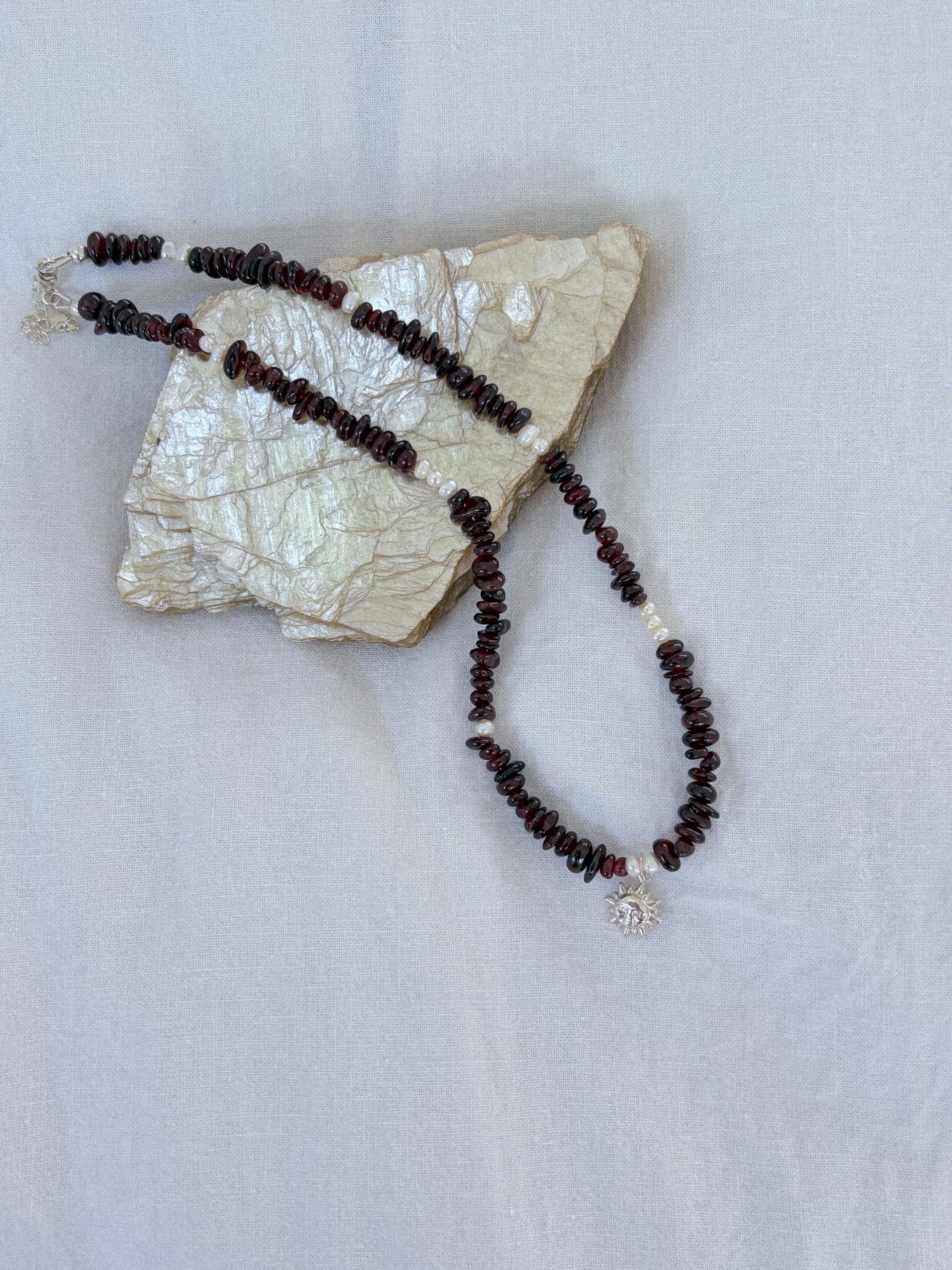 Garnet & Pearl with silver Sun