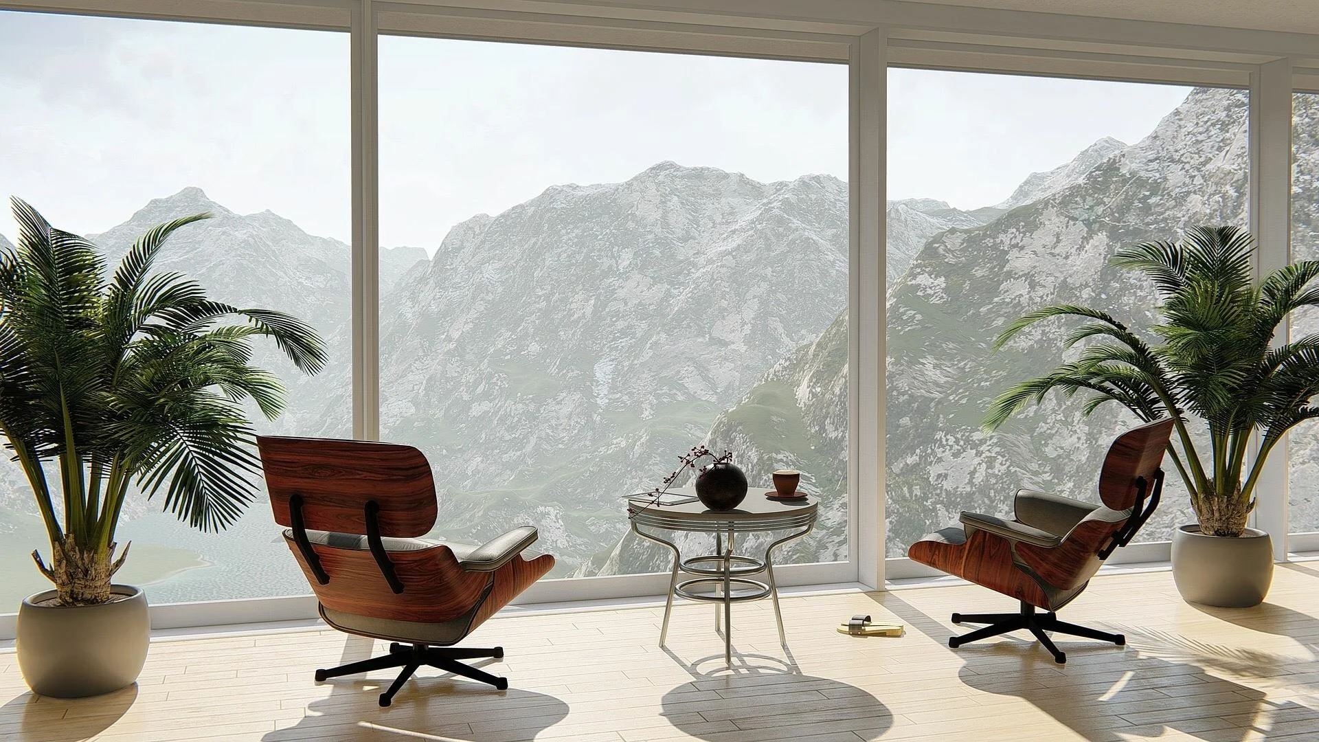 Two modern lounge chairs facing a panoramic mountain view through floor-to-ceiling windows, symbolizing shared perspective, empathy, and connection in therapy. Minimalist interior with potted plants & a small table, evoking calm, reflective presence.