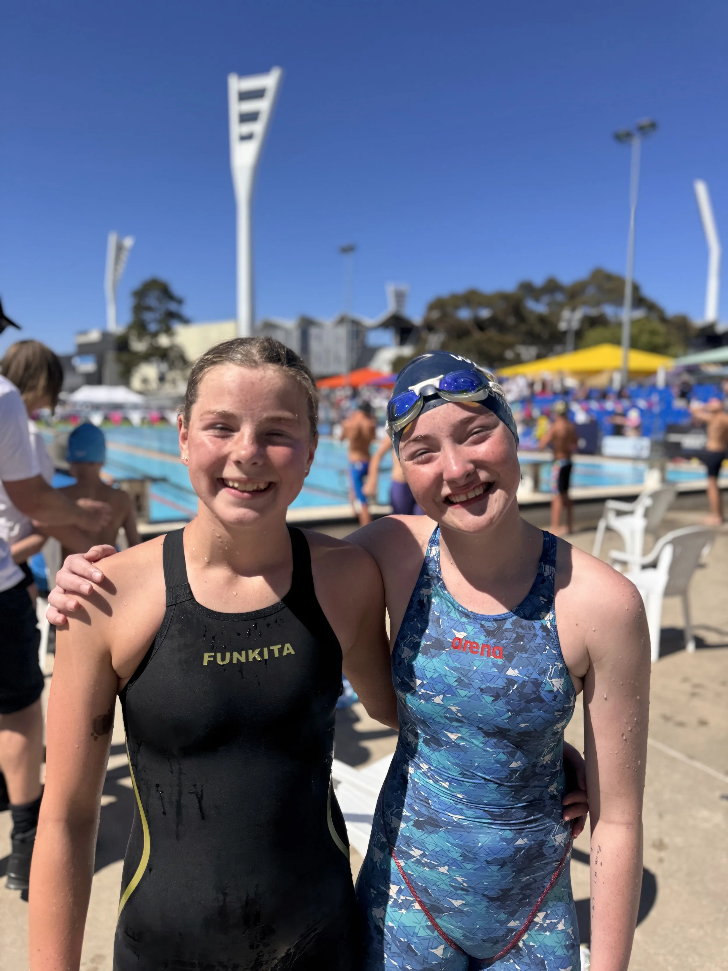 A photo of two Warragul Swimming Club development squad members