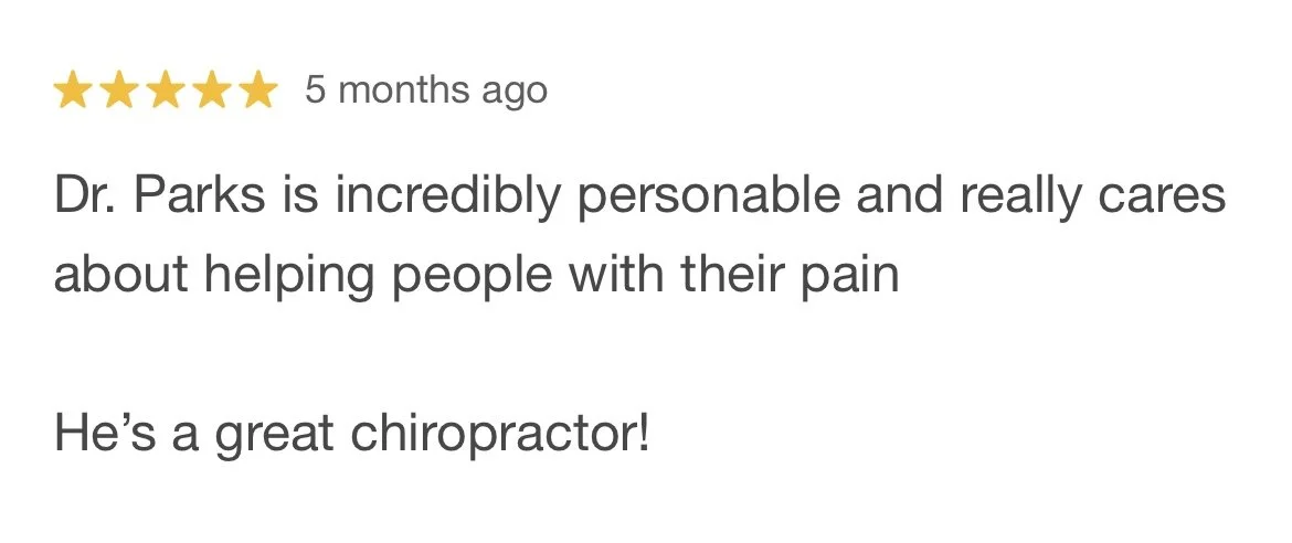 Customer review with five-star rating for Dr. Parks, praising his Personable care and chiropractic skills.