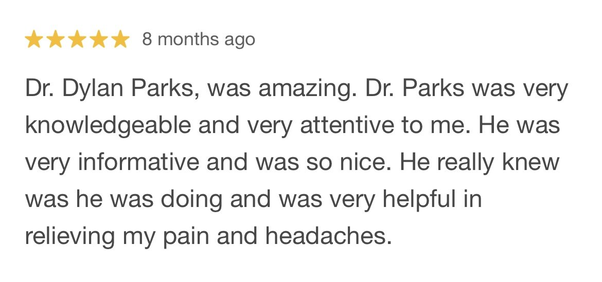 Customer review with five stars, dated 8 months ago, praising Dr. Dylan Parks for being knowledgeable, attentive, informative, kind, and helpful in relieving pain and headaches.