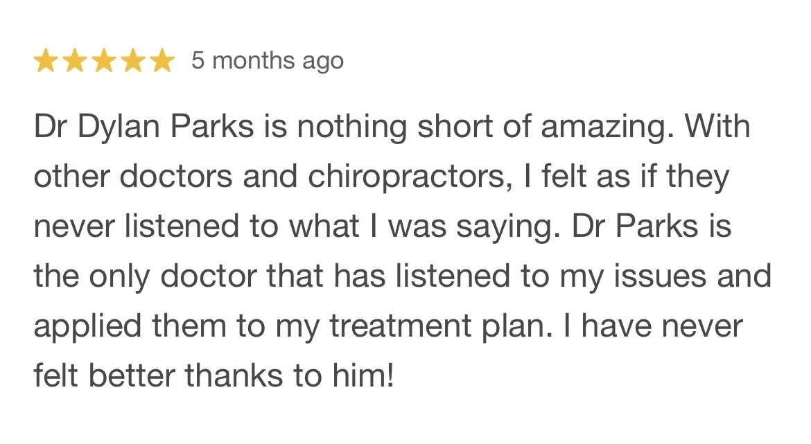 Review with five gold stars, dated five months ago, praising Dr. Dylan Parks for listening and providing effective treatment.