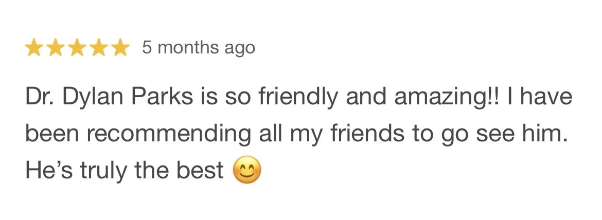 Online review showing five stars, written five months ago, praising Dr. Dylan Parks as friendly and amazing with a smiling emoji.