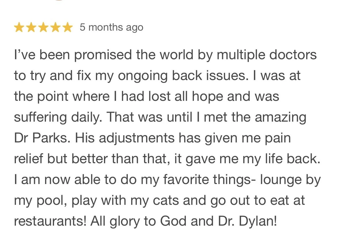 Customer review with five-star rating positive testimonial about back pain relief after visiting Dr. Parks, expressing gratitude and improved quality of life.
