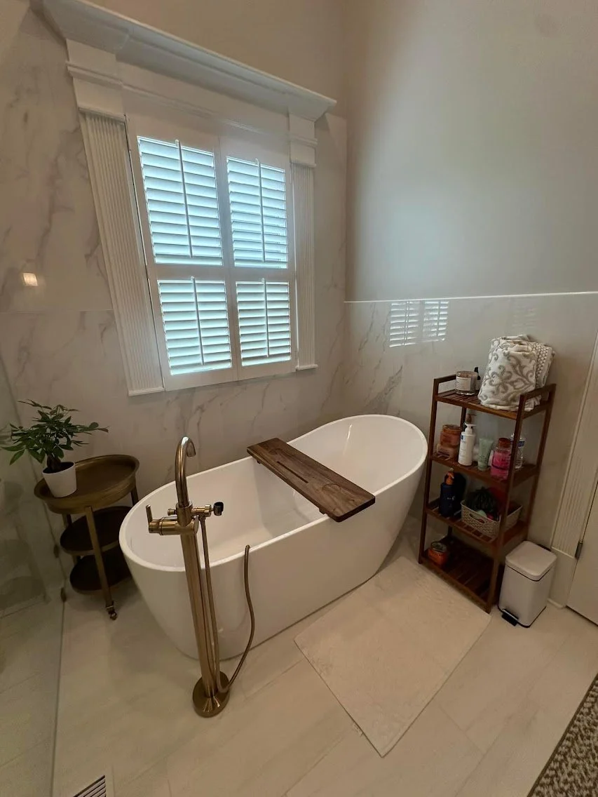 Modern bathroom remodel with custom tile shower, updated flooring, vanity upgrade, and fresh paint in West Georgia home.