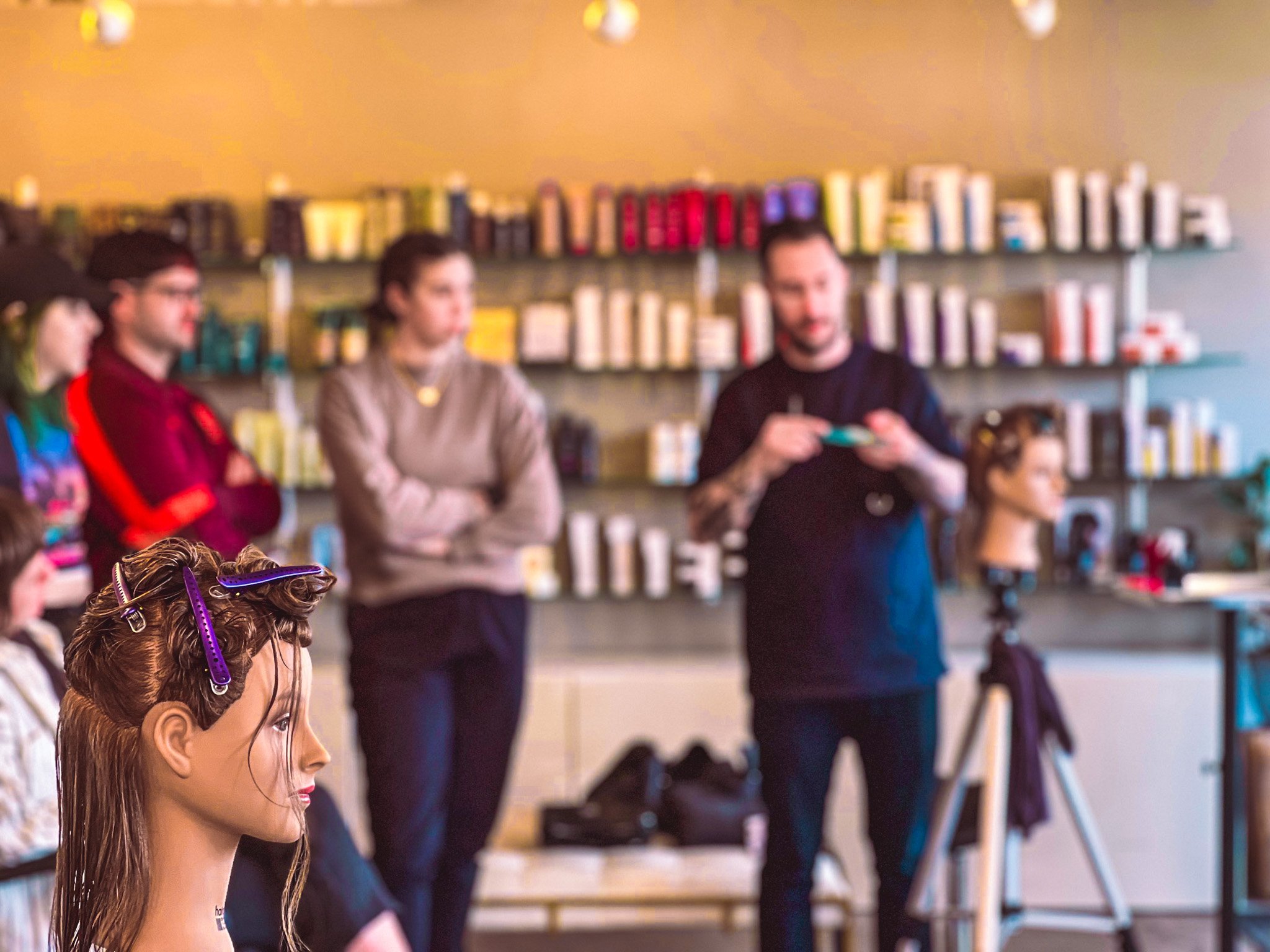 Aran Beattie teaches the short hair class at Starling Salon in Denver.