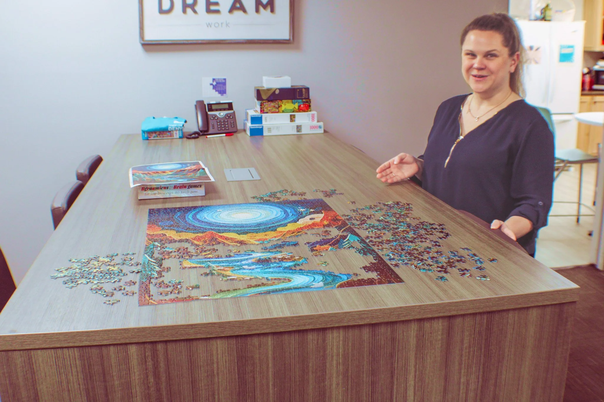 Chelsea shows a fun corner of the building where someone's been working on a puzzle.