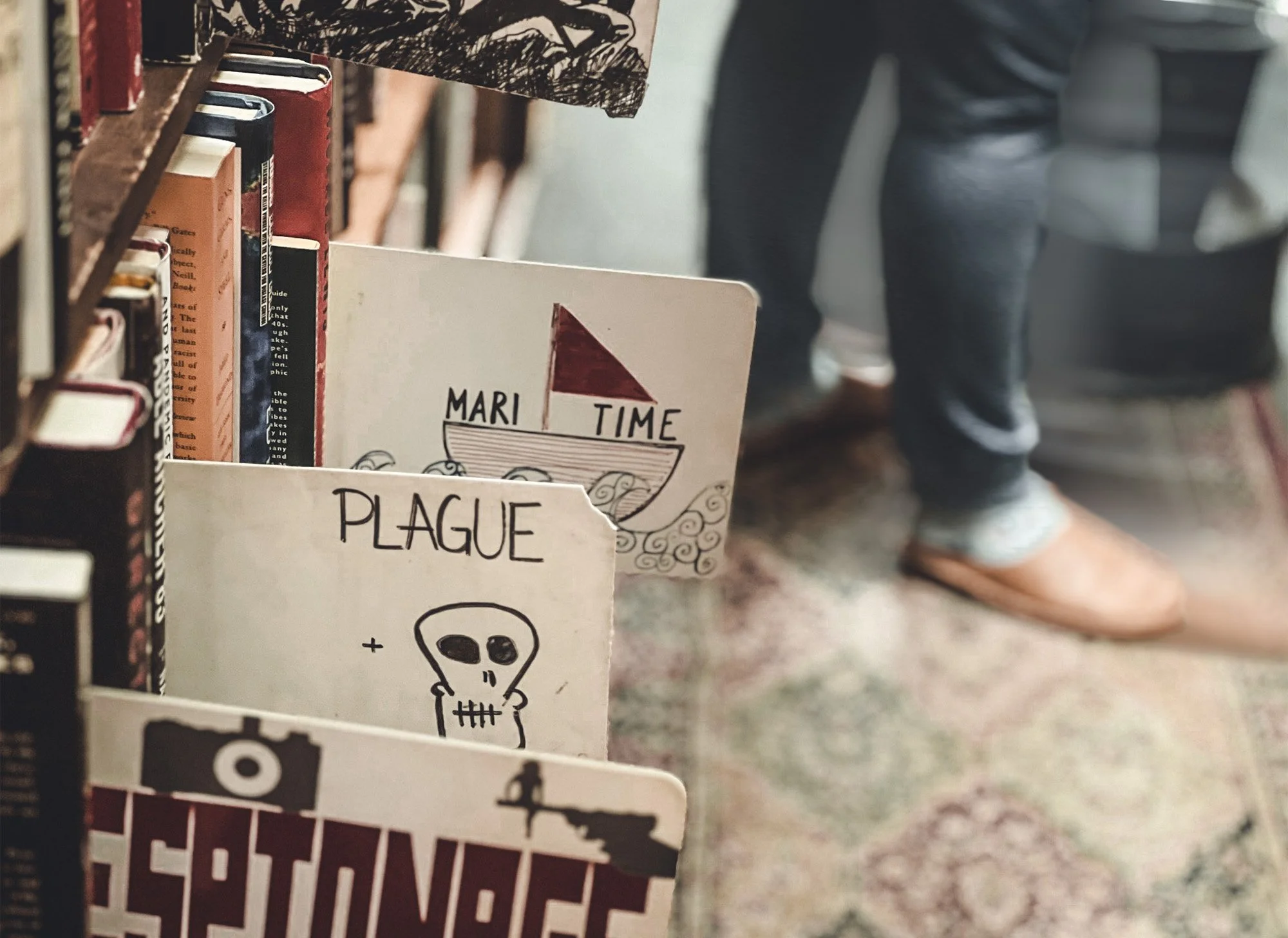Brianne moves past the more gruesome genres at Kilgore Books in Denver.