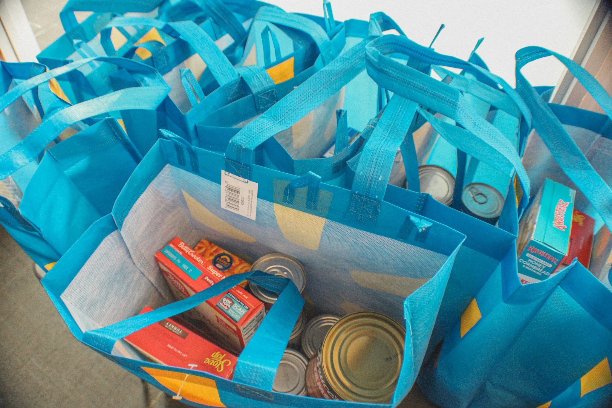 Bags of food await guests, already packed.