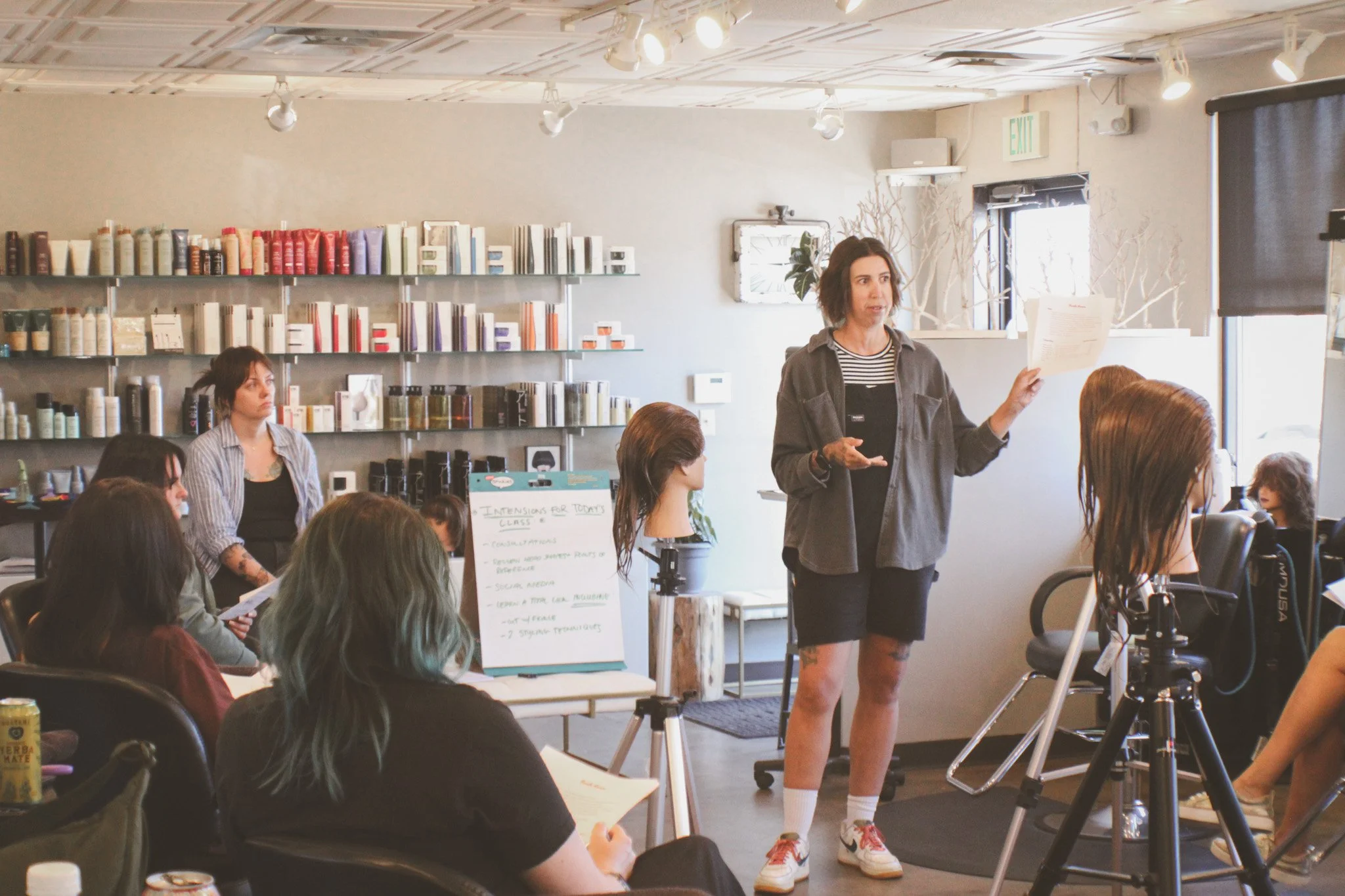 Hallie Kastanek introduces new ideas to the Starling Salon team.