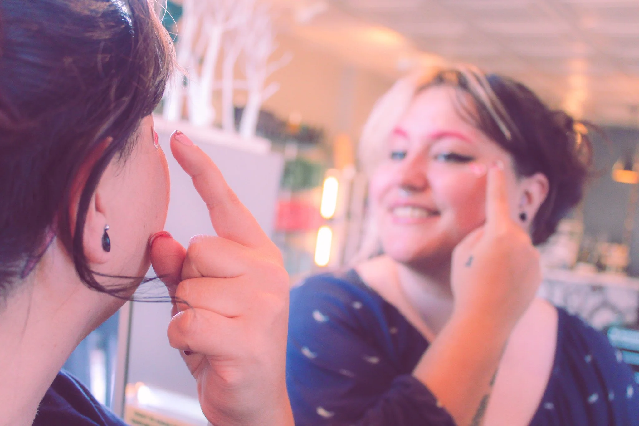 Hailee adds some spice to Valentine's Day with love-themed face stickers.