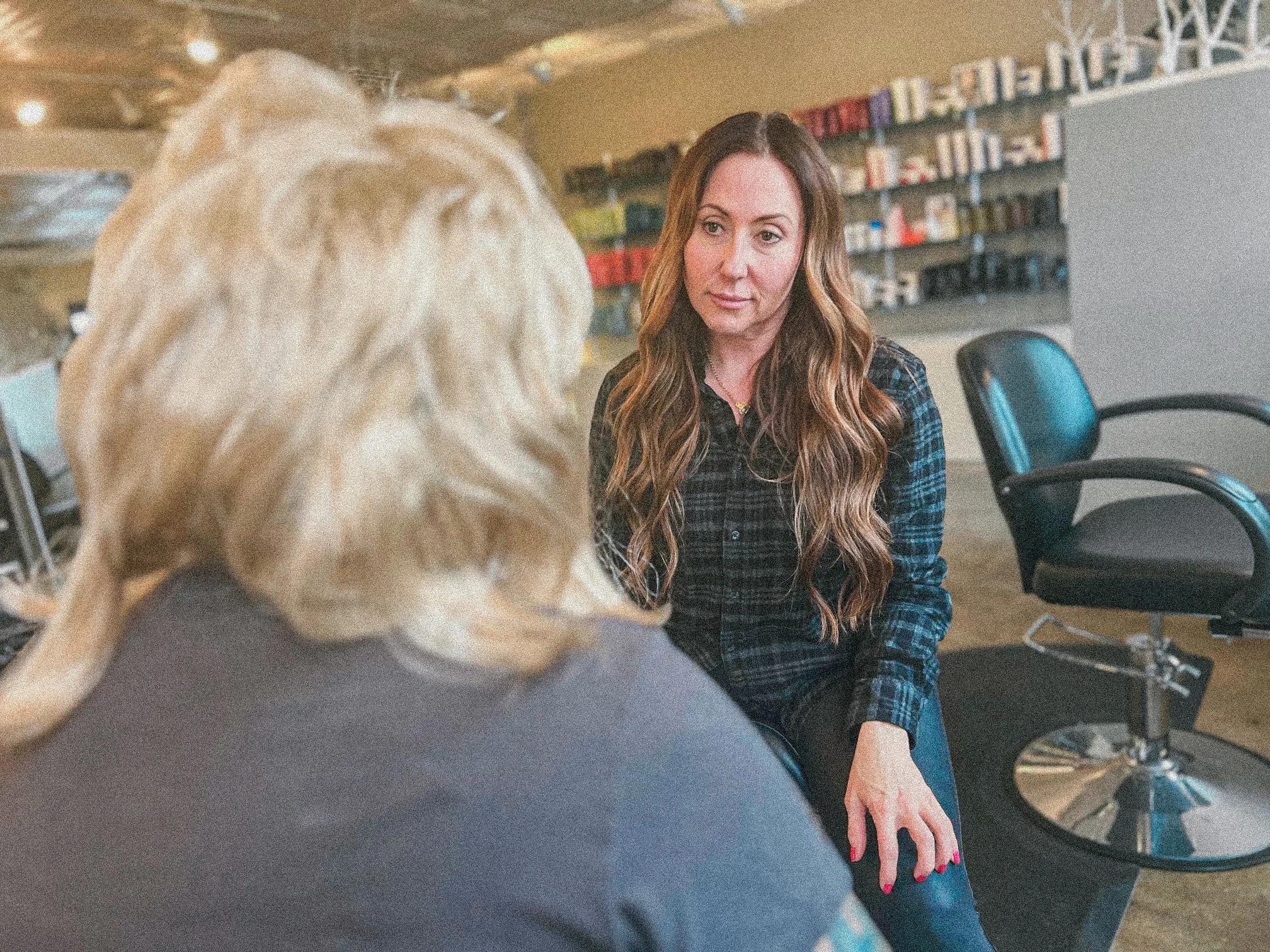 Sonia Nordmeyer consults with a guest at Starling Salon.
