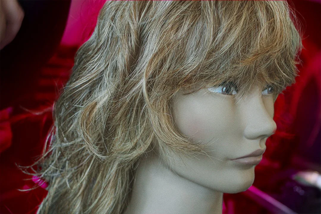 A mannequin with a freshly cut shag.