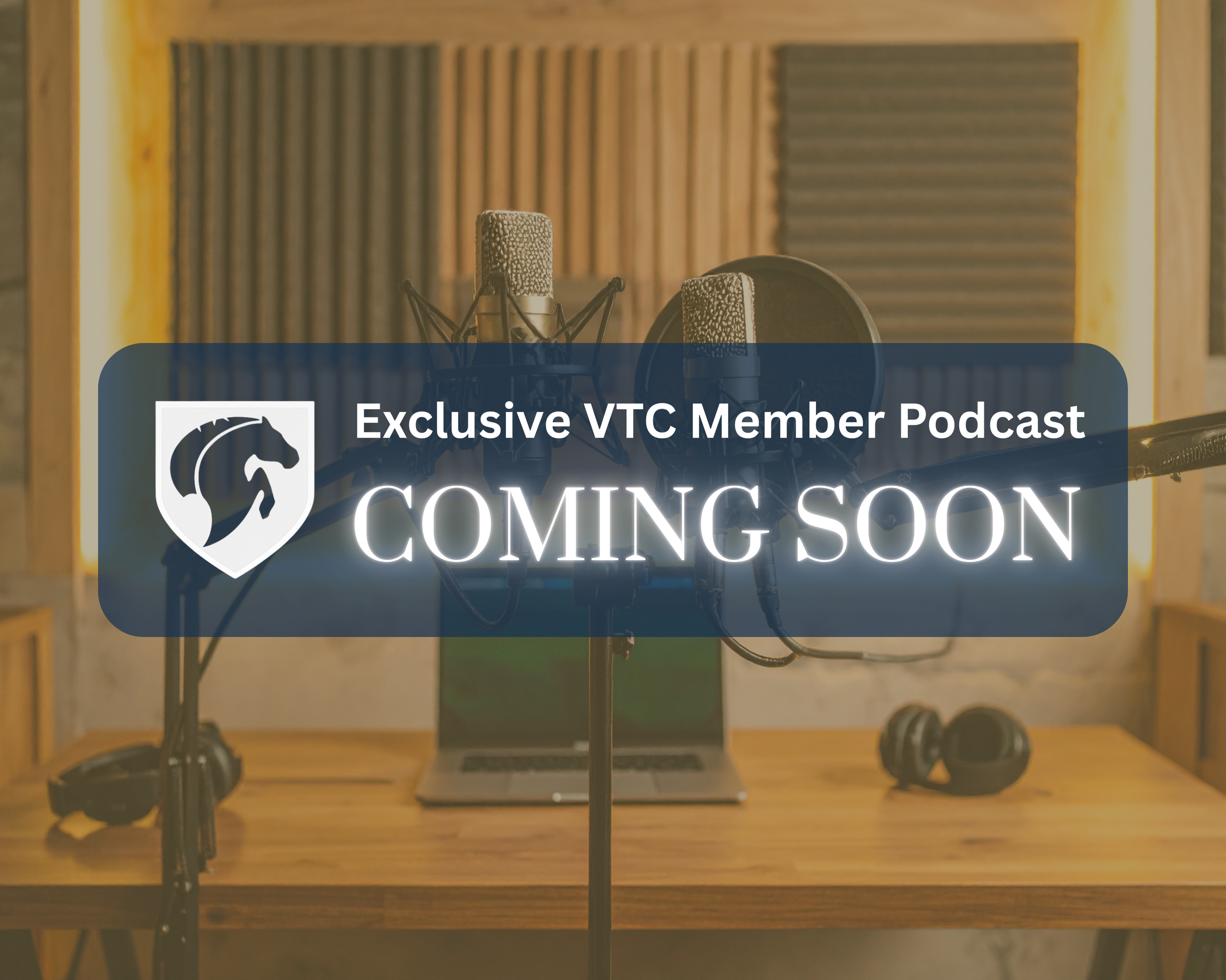 Recording studio with two microphones on stands, headphones on a wooden table, and a laptop, with soundproofing panels on the walls. Overlay text reads "Exclusive VTC Member Podcast Coming Soon."