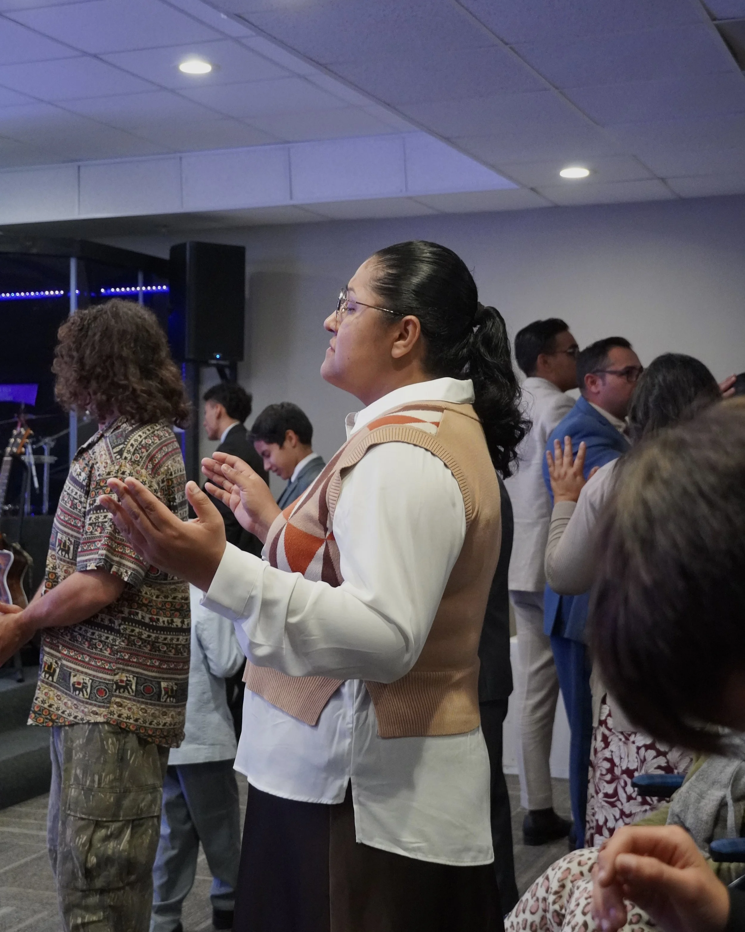 Members of Strong Tower Pentecostal Church worshiping during their Spanish service.