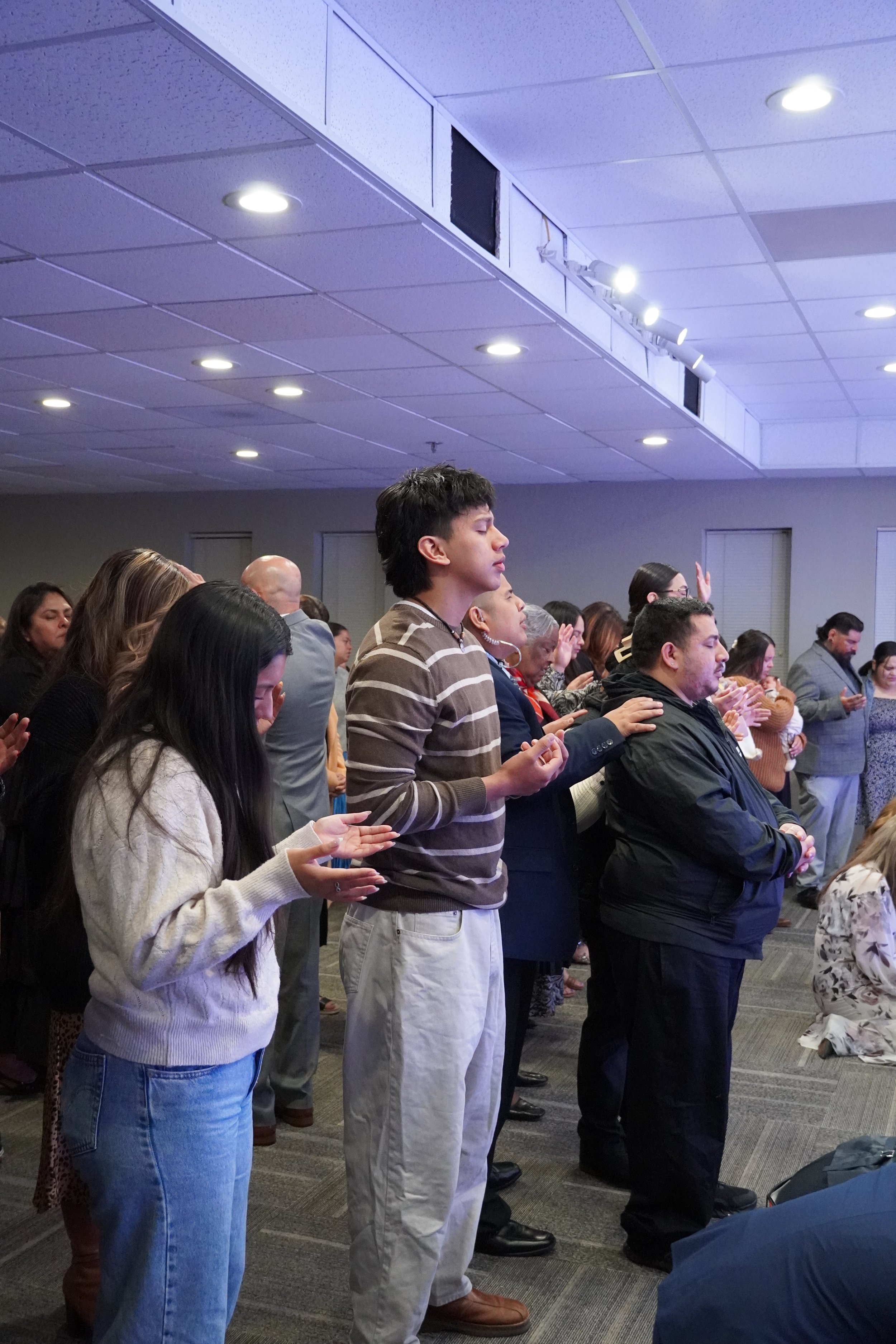 Congregation worshipping at Strong Tower Pentecostal Church in Santa Maria, CA during Sunday service