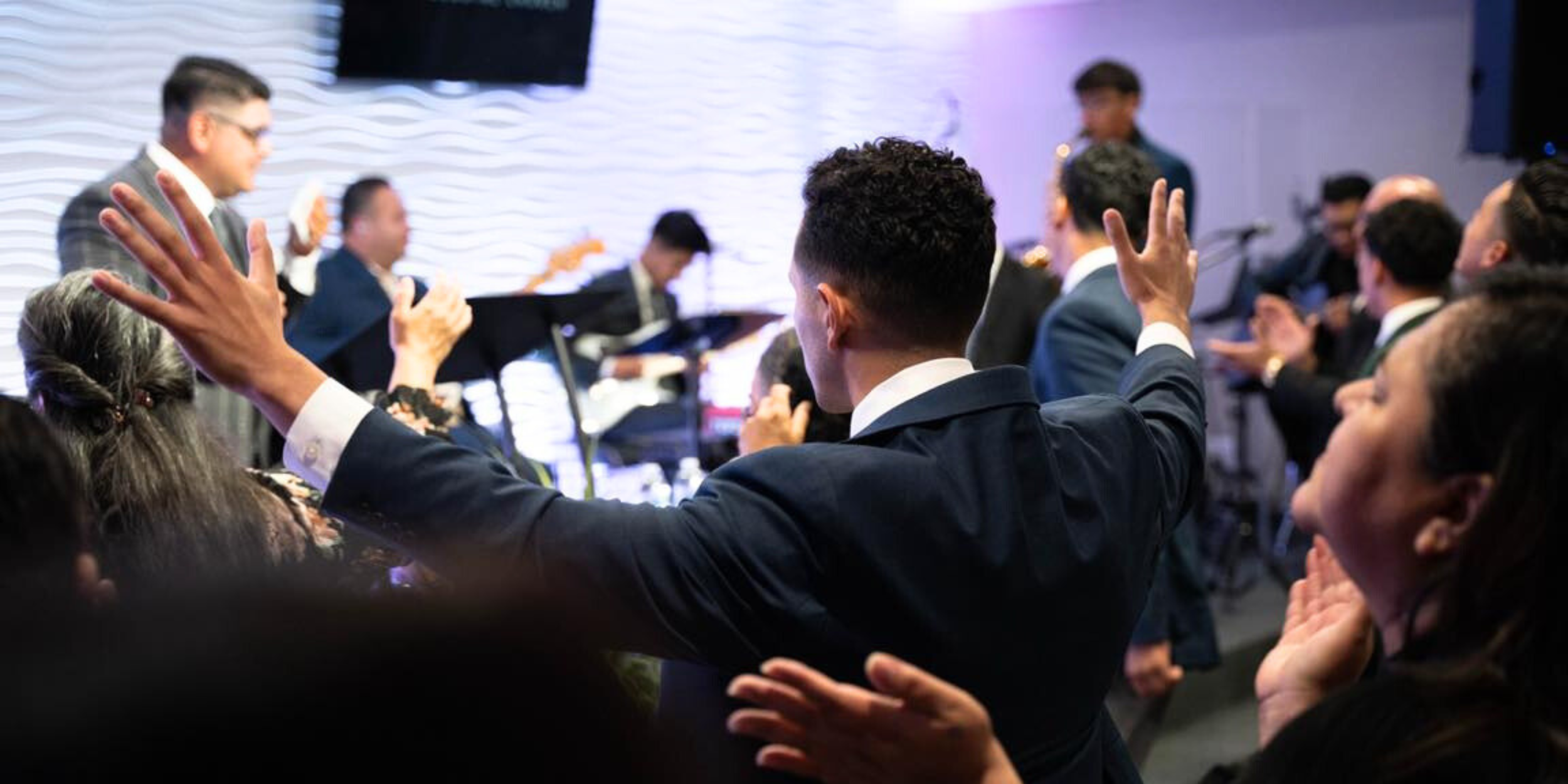 Members of Strong Tower Pentecostal Church worshiping during their Spanish service.