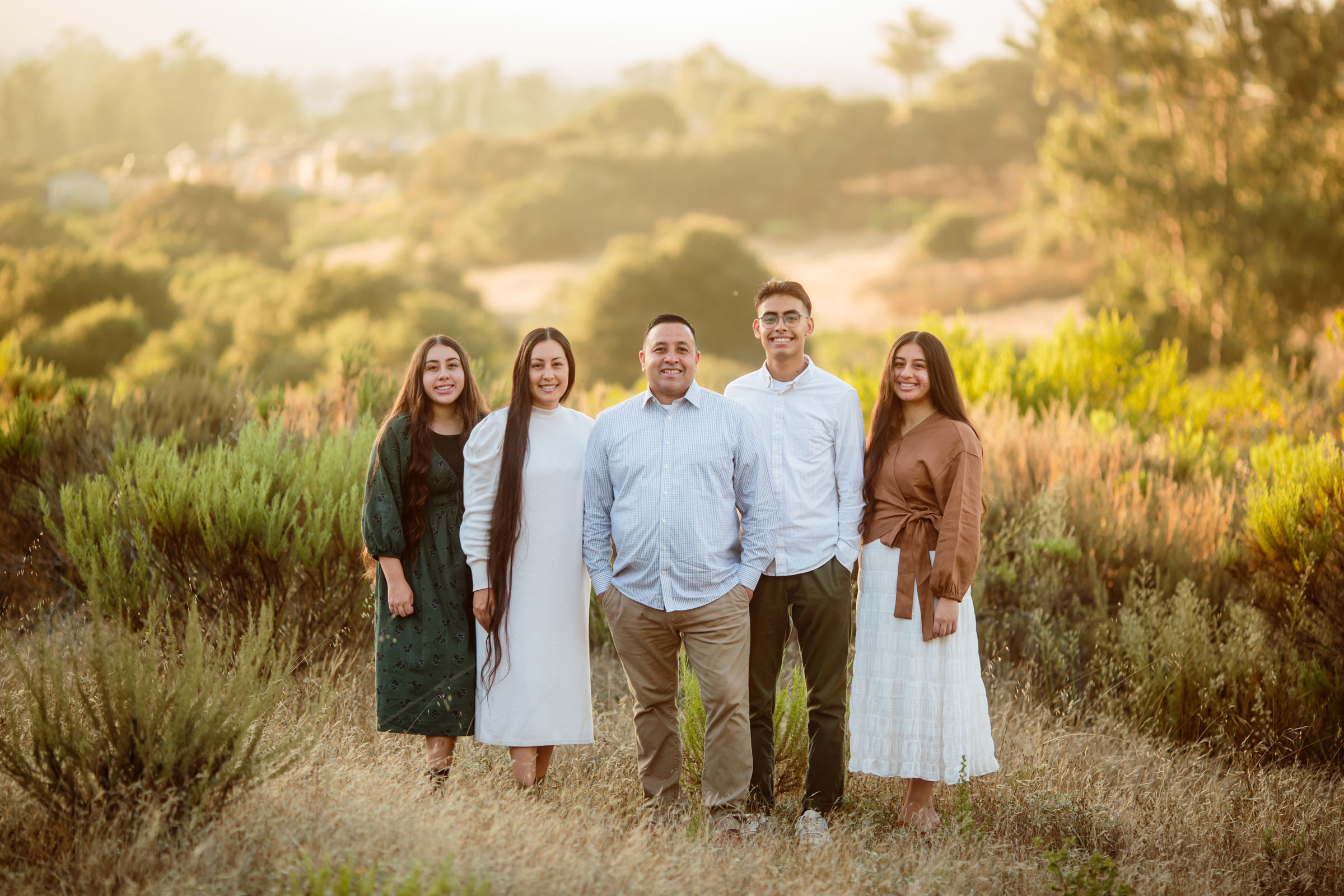 Family photo of Pastor Cruz and his family with Strong Tower Pentecostal Church.