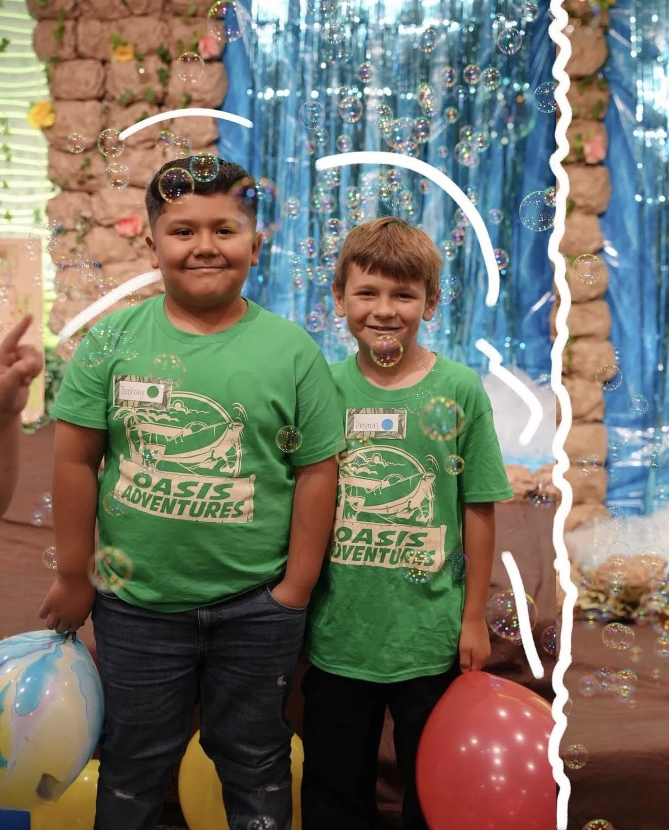Children smiling and holding balloons at Strong Tower Pentecostal Church kids ministry in Santa Maria, CA