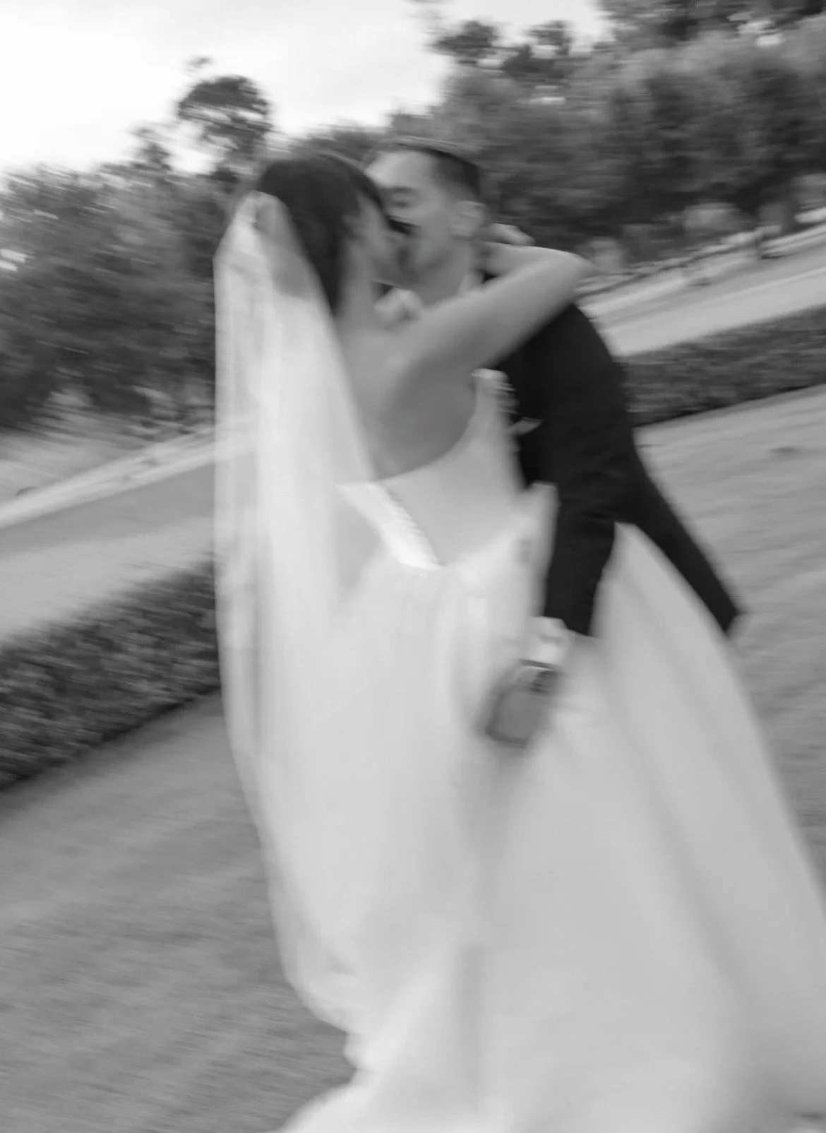 Just married couple sharing their first kiss at Terrara House on the NSW South Coast.