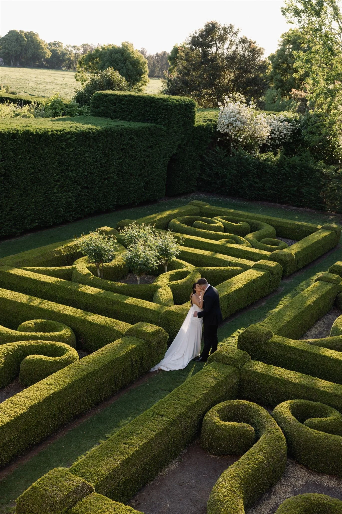 Newly married couple kissing after their wedding ceremony at Terrara House NSW.