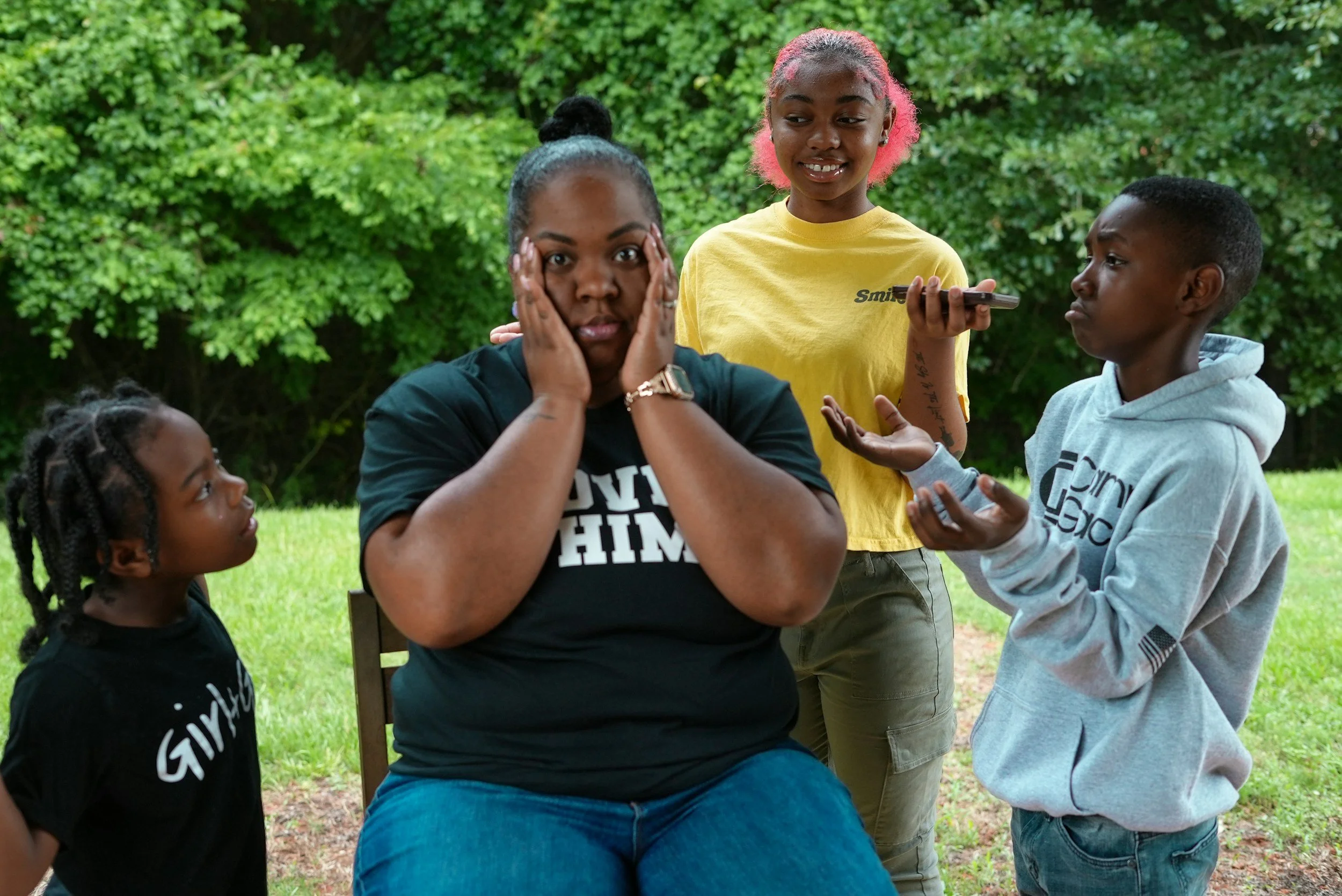 Overwhelmed mother surrounded by children needing her attention, illustrating parental stress, maternal burnout, caregiving fatigue, and mental health challenges faced by many mothers.