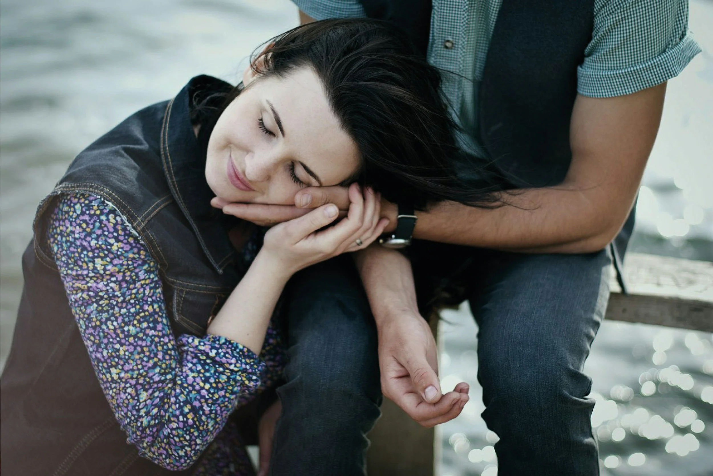 Woman resting comfortably beside a supportive companion, representing emotional support, compassion, and helping a loved one through depression.