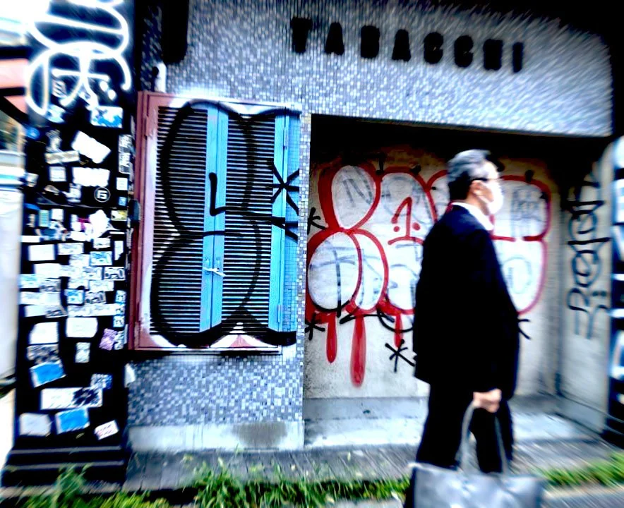 business man grafitti.jpeg