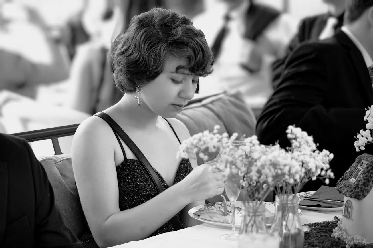 young lady enjoying a reunion dinner before the dance.jpg