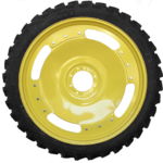 Yellow circular object, possibly a robot vacuum wheel or part of a machine.