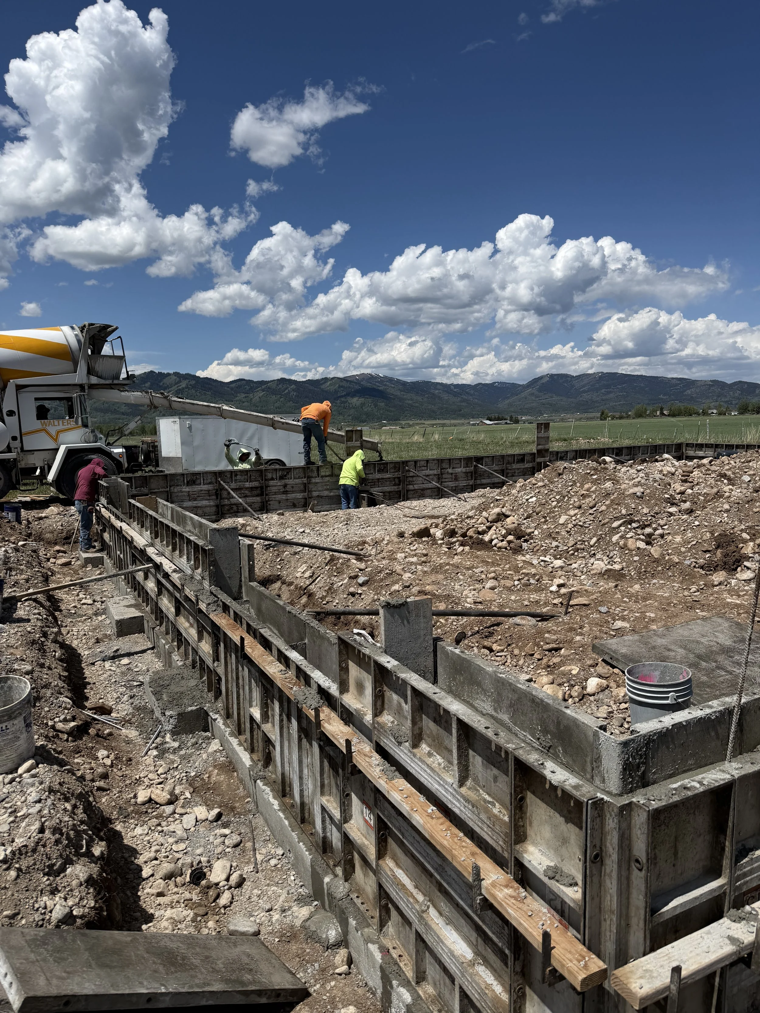 Concrete footings and reinforced foundation prepared for the Victor, Idaho steel shop.