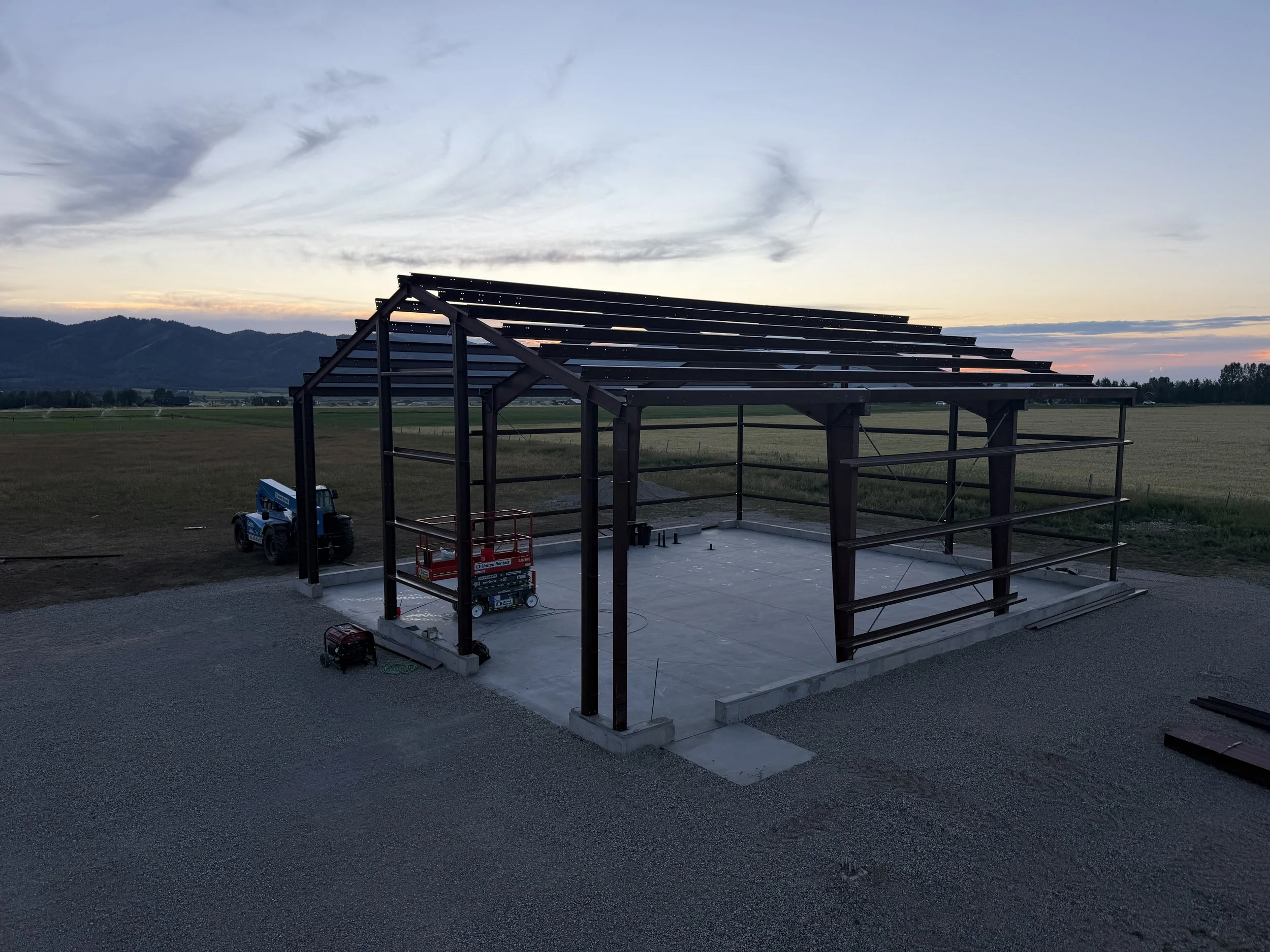 In-house steel frame erection for a 50-by-50 commercial metal shop in Victor, Idaho.