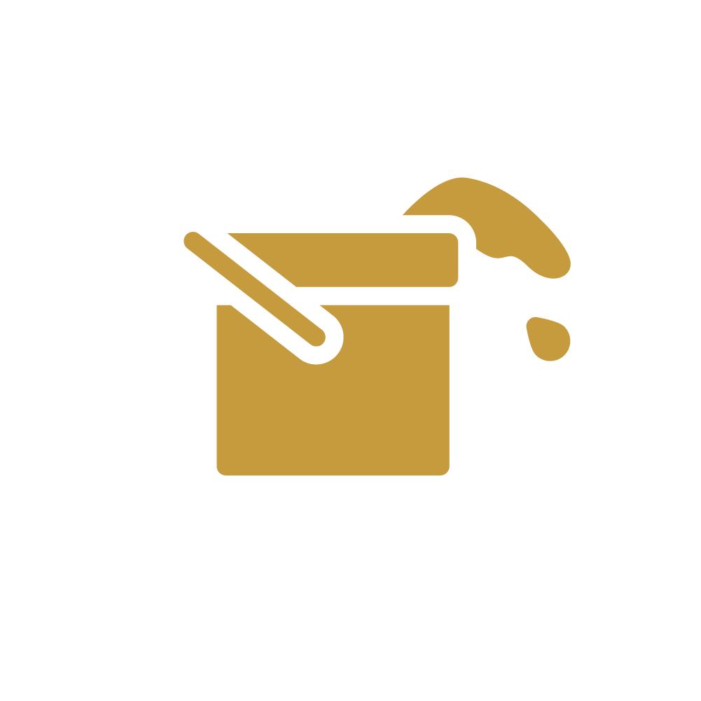 A black and gold illustration of a box with a spatula and sauce bottle, representing cooking or food preparation.