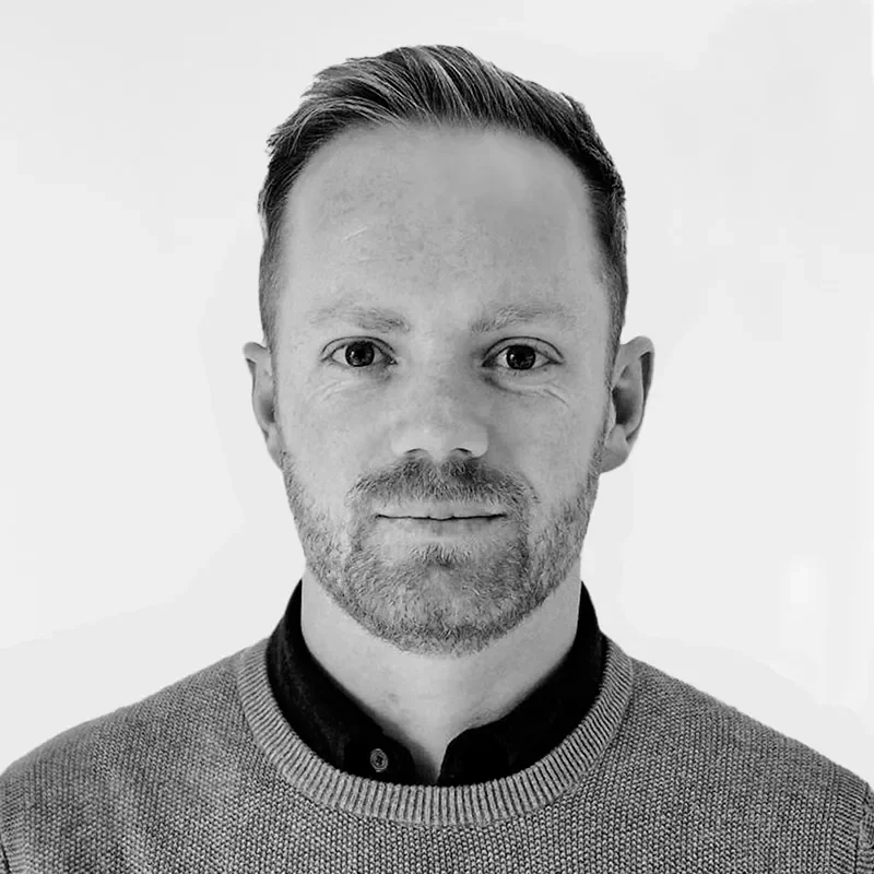 Black and white portrait of Jason from SkyGeo’s leadership, specialising in applying InSAR insights to real-world ground stability and asset monitoring