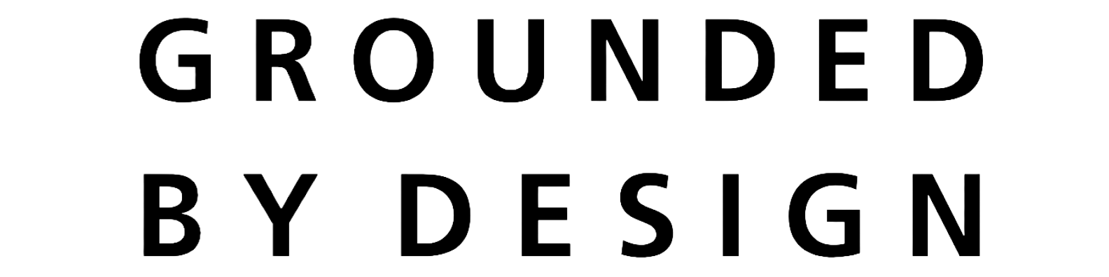 Texte en anglais disant "Grounded by Design" sur un fond blanc