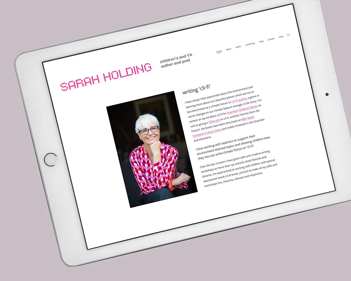 Sarah Holding iPad-3.jpg